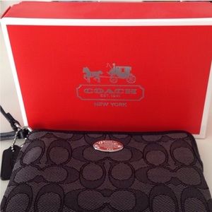 New Coach Zip Around Wristlet